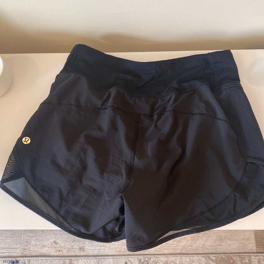 Black lululemon shorts size 4